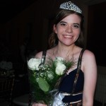  All smiles from Prom Queen, Jenny Anderson, as she accepts her flowers and crown with grace. 