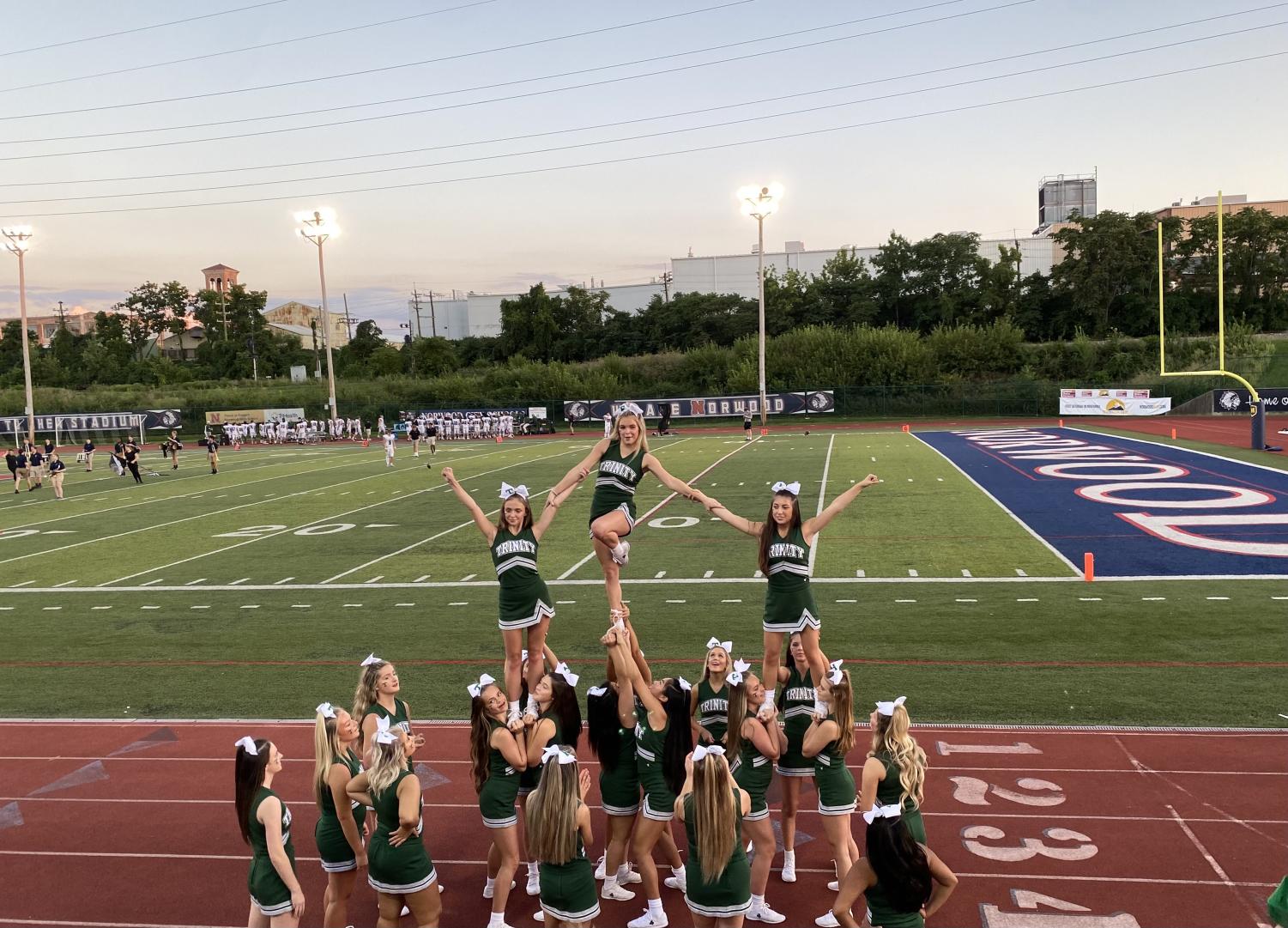 Shamrocks, Tigers, and Colts, Oh My! What it is Like Being an Assumption Student Cheering at Louisville's All-Boys Schools