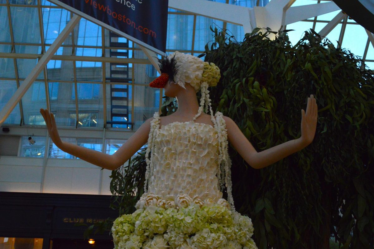 Bostons floral mannequin was created by Winston Flowers and inspired by the iconic swan boats in Bostons Public Garden.