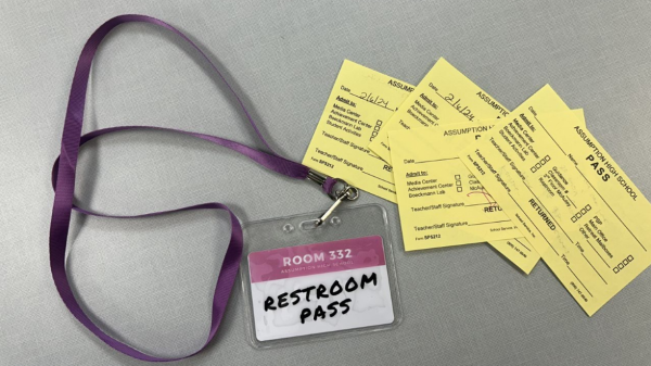 Newly instituted bathroom lanyard passes and yellow pass slips frequent the AHS halls when classes are in session.